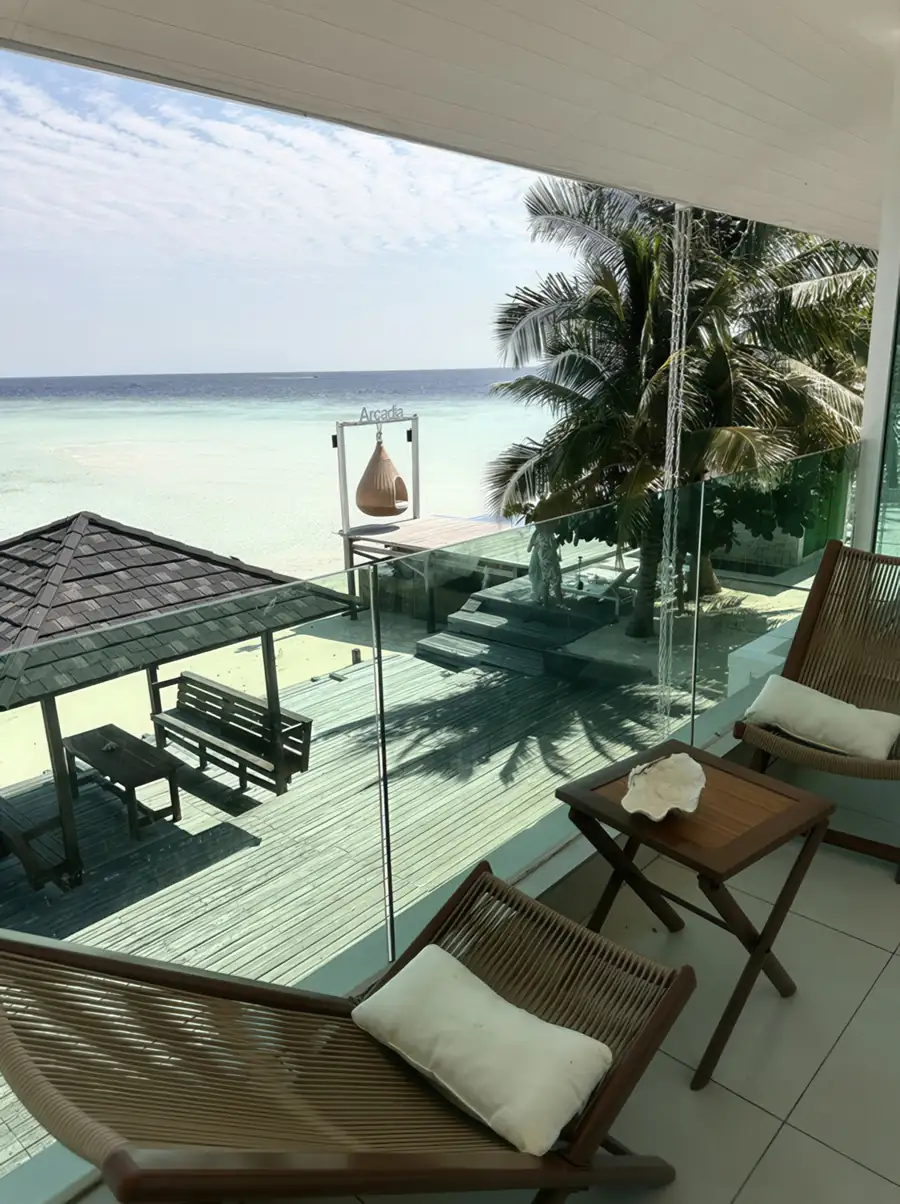 Private overwater balcony deck at Arcadia Beach Resort