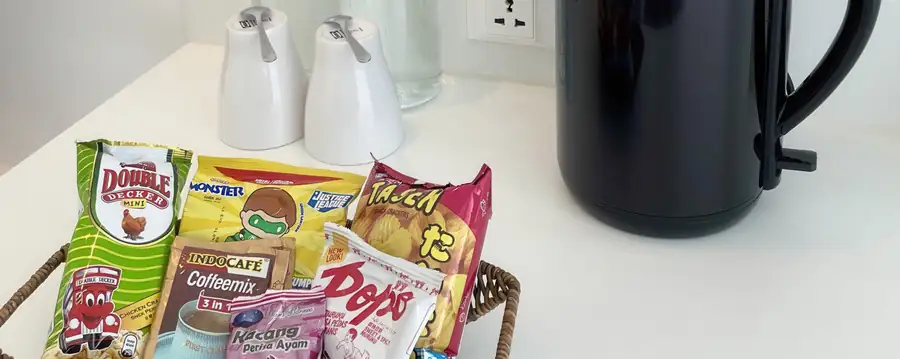 Room snacks and welcome water in Standard Garden Room