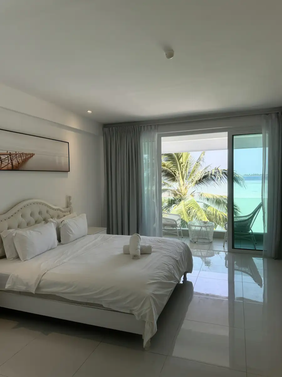 King bedroom with sea view at Arcadia Beach Resort