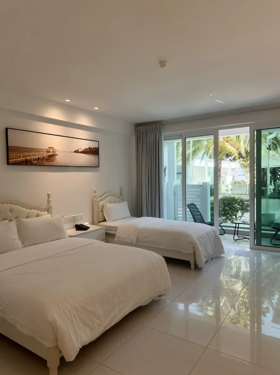 Family bedroom with garden view at Arcadia Beach Resort